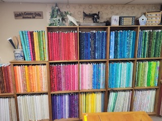 Many shelves of batik fabrics