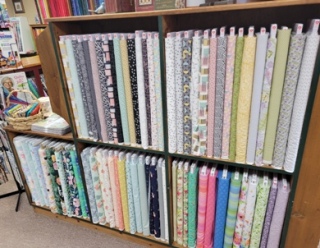 Shelves of fabrics