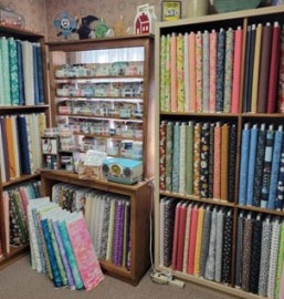 Southeast corner of the store filled with Moda fabrics